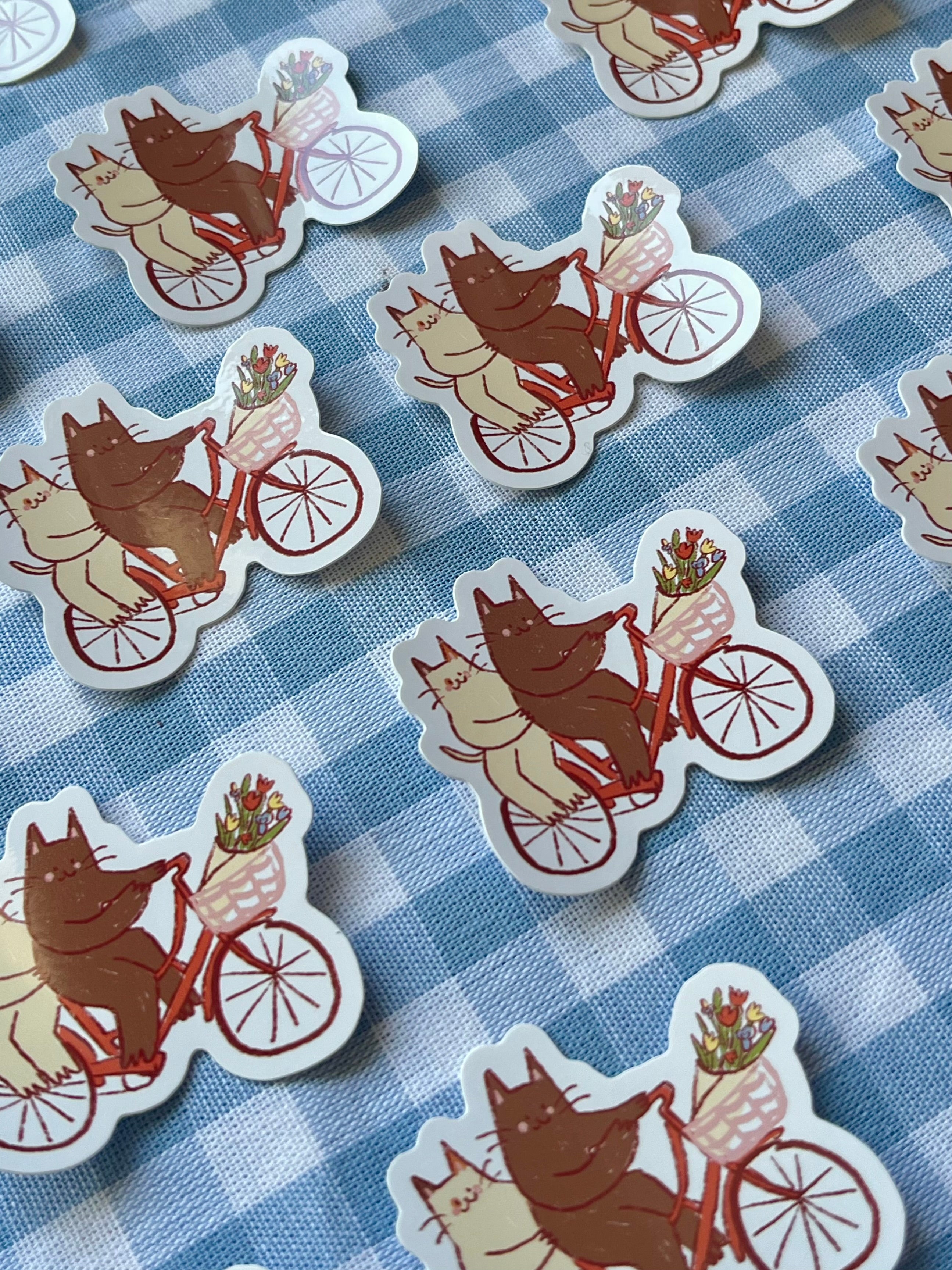 Cycling cats sticker