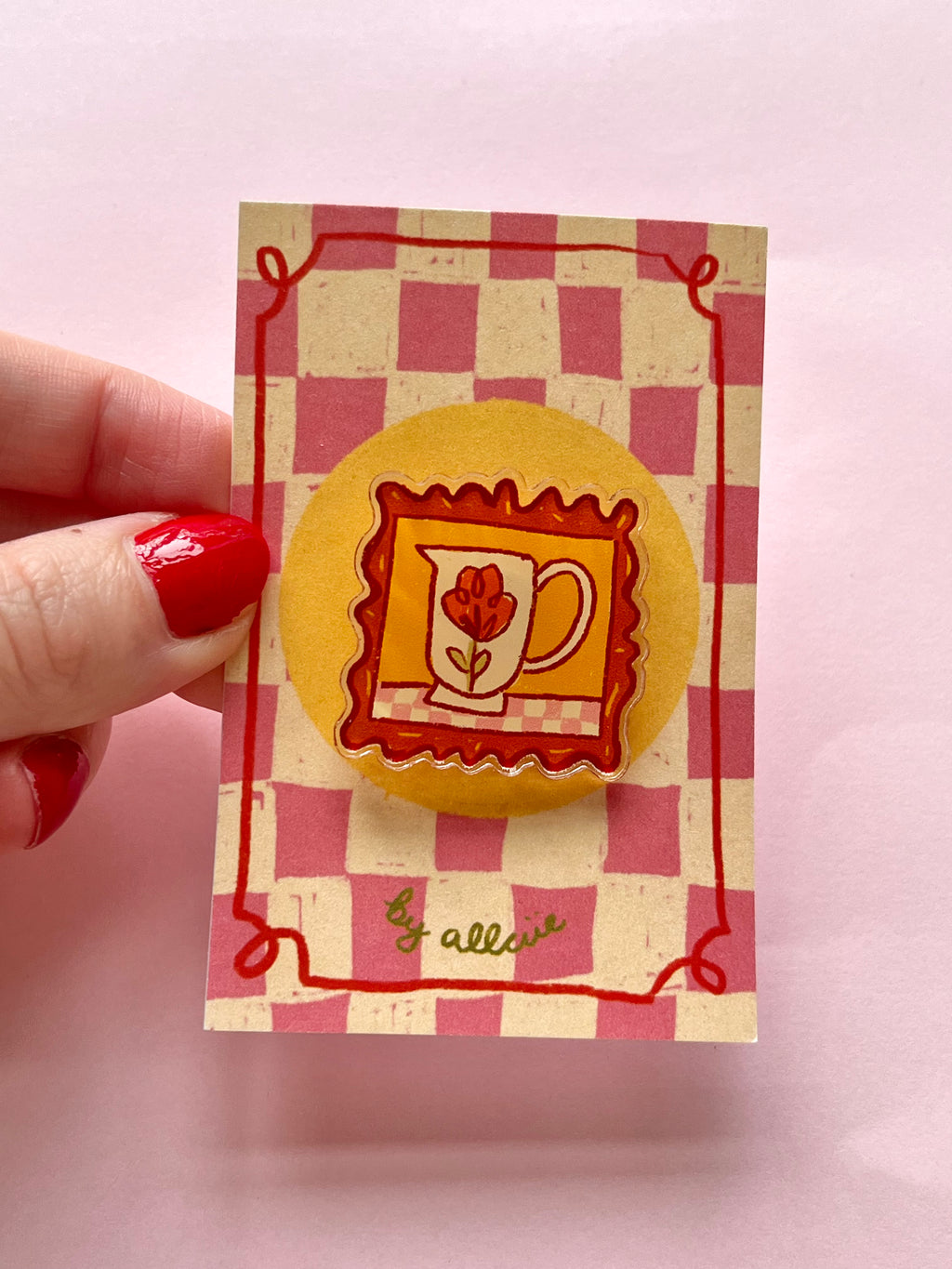 Framed flower pin badge