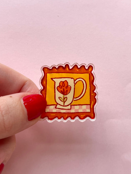 Framed flower pin badge