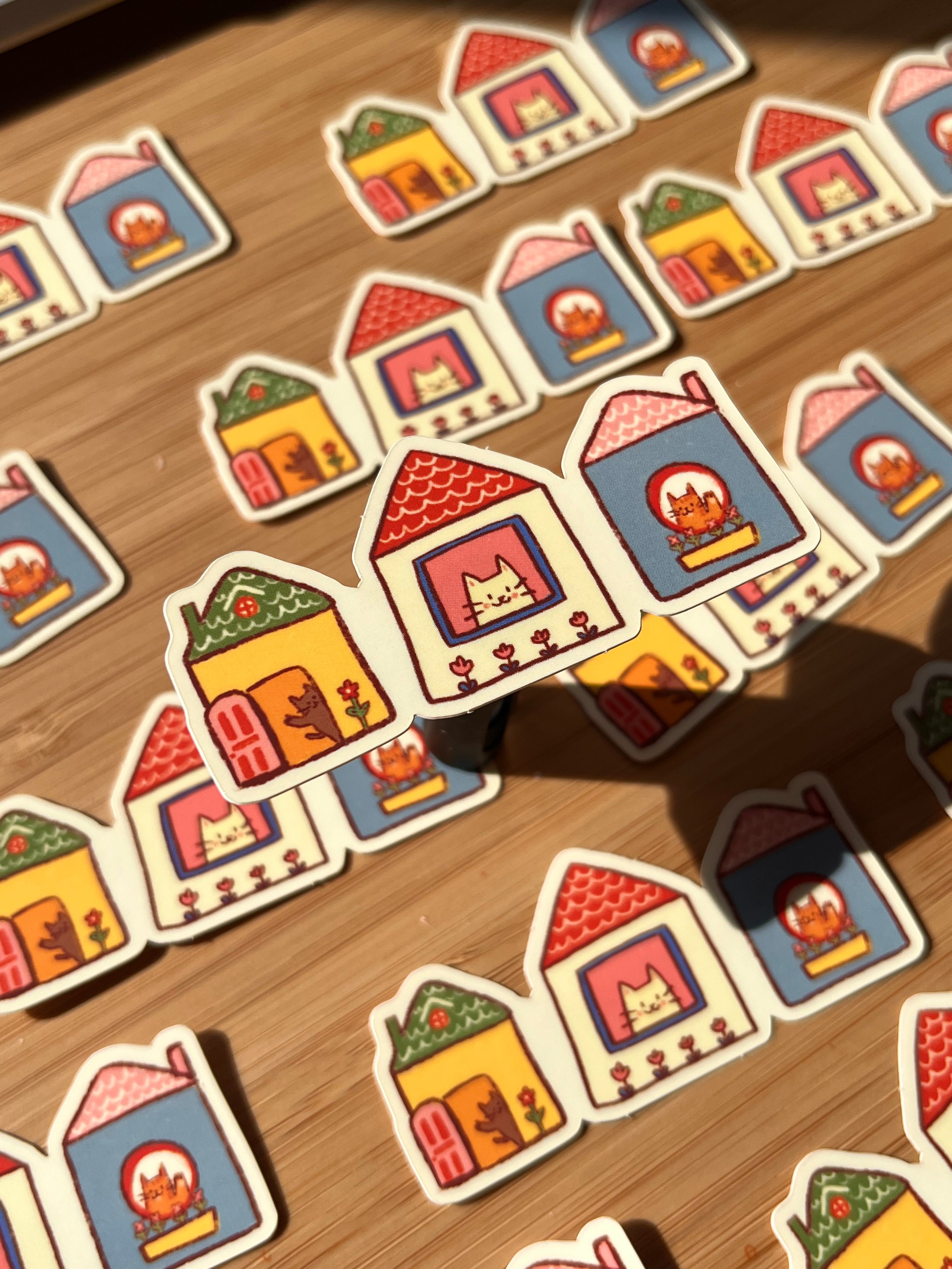 3 Cats in houses sticker