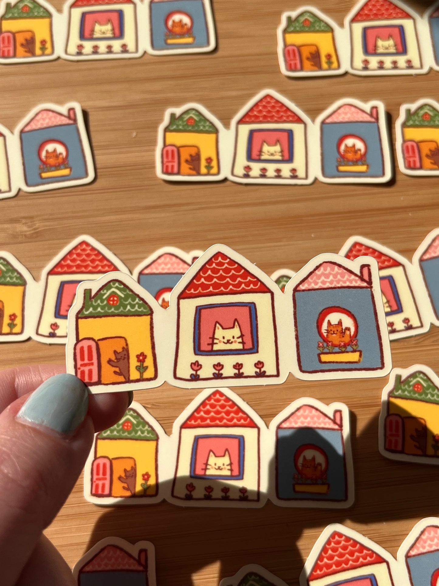 3 Cats in houses sticker